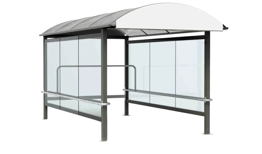 Empty modern shopping cart shelter with curved translucent roof and glass enclosure designed for grocery and retail stores.