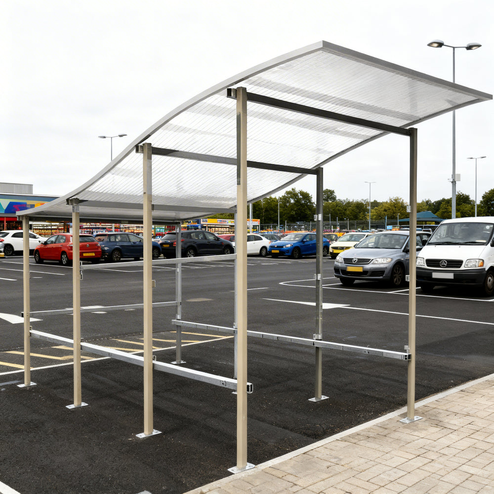 Close‑up of curved polycarbonate roof panel on TAIMCO shopping cart shelter showing weather‑resistant construction.