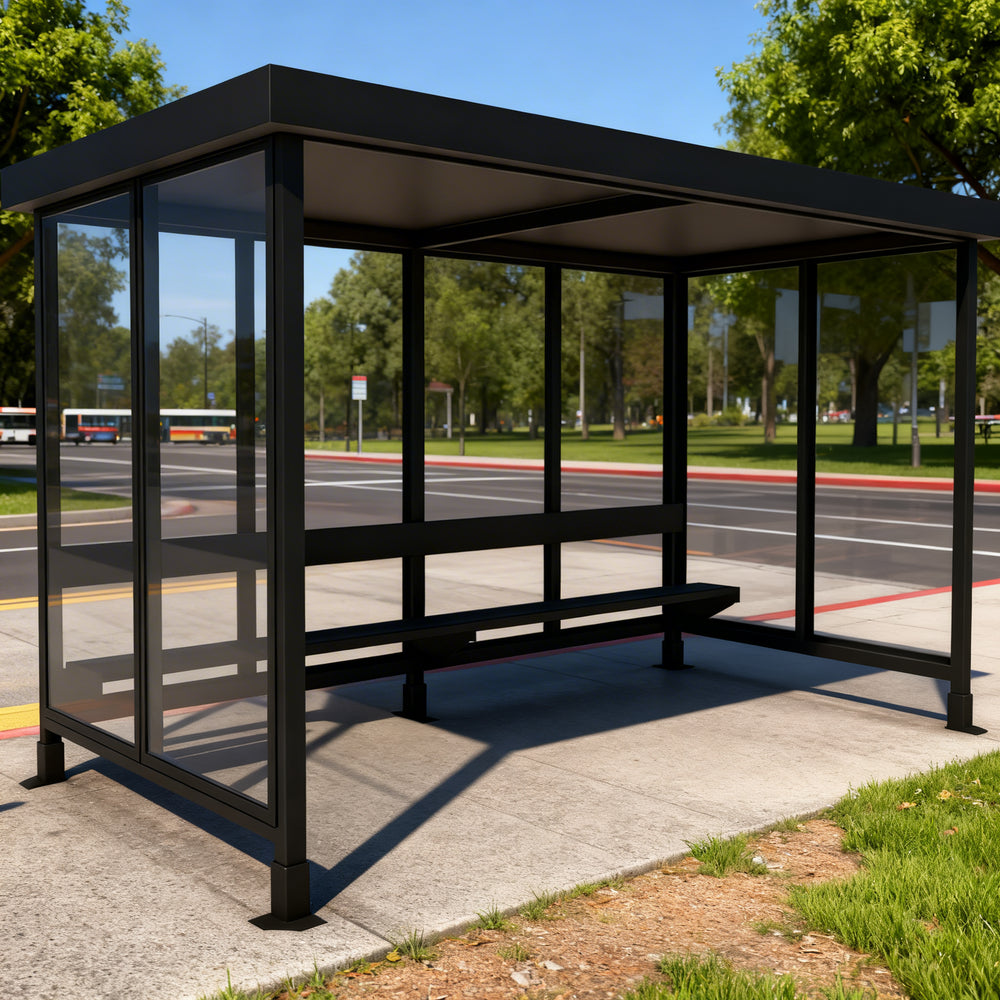 Empty modern bus stop shelter with flat roof, glass enclosure, and built‑in bench designed for public transportation stops.
