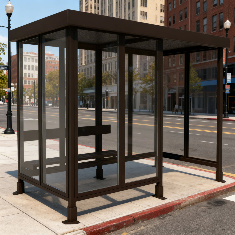 Empty modern bus stop shelter with flat roof, glass enclosure, and built‑in bench designed for public transportation stops.