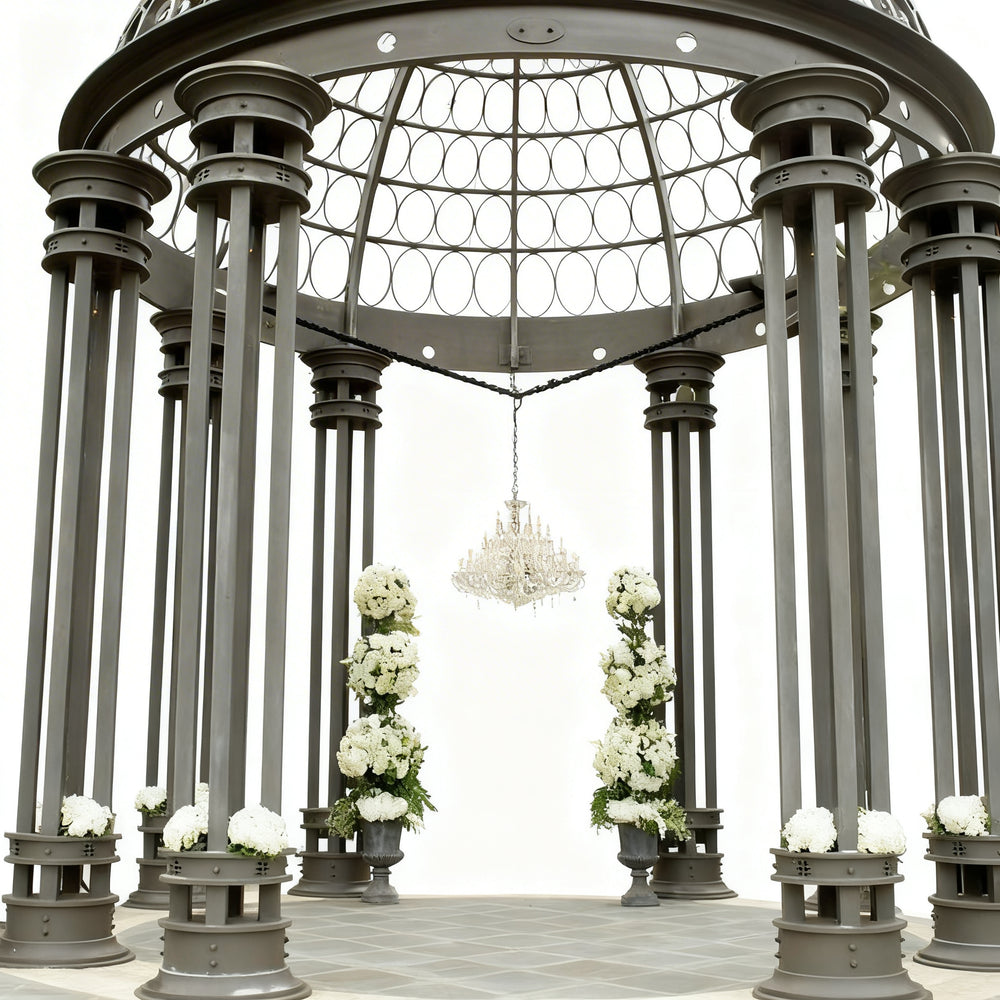Front view of ornamental metal dome structure with decorative patterns