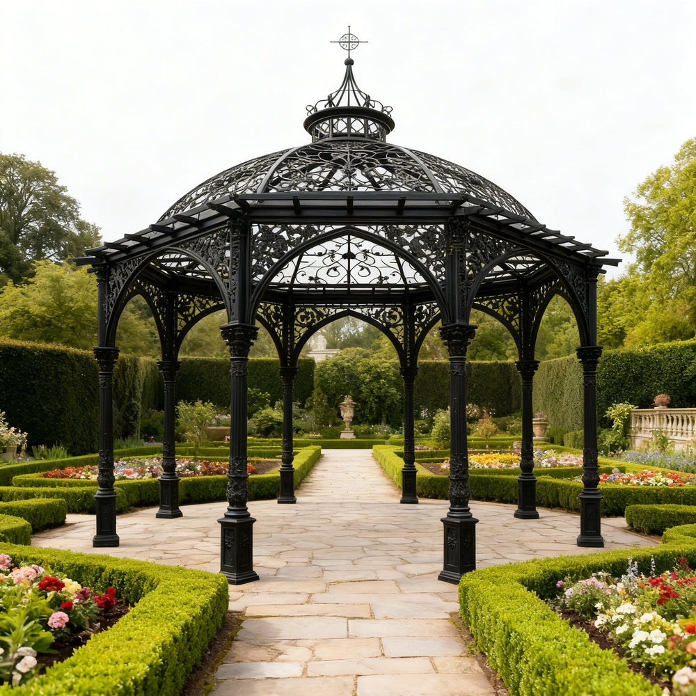 Ornate black gazebo in a garden setting with manicured hedges and flowers.