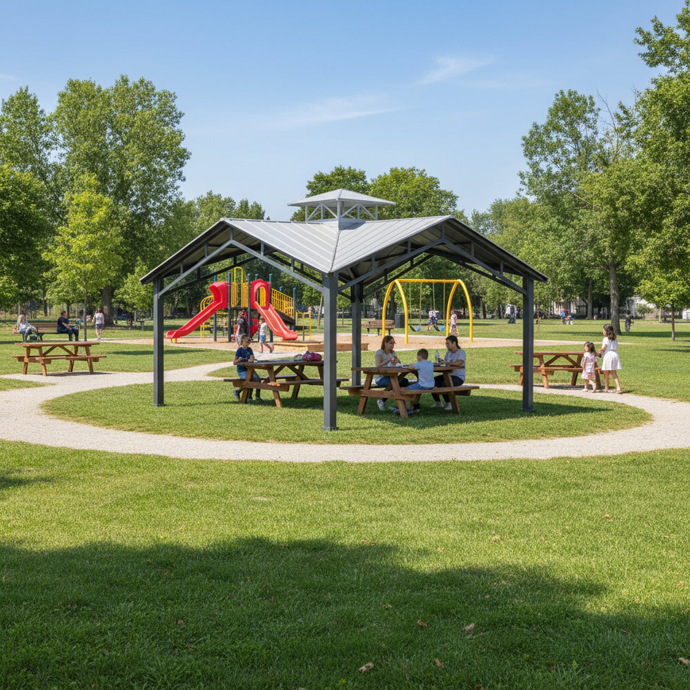 Children playing on a playground with a covered picnic area in a park.