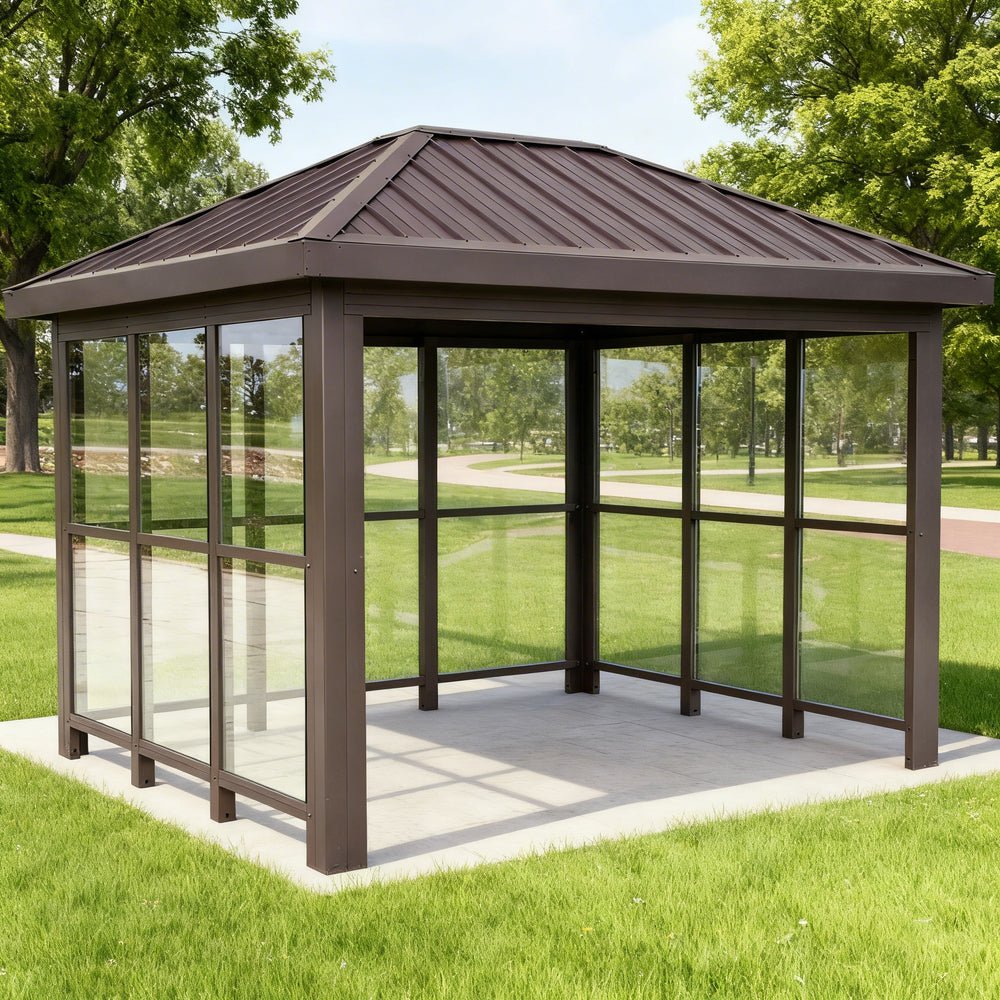 Side profile of modern bus stop shelter featuring slanted roof design and transparent glass enclosure.