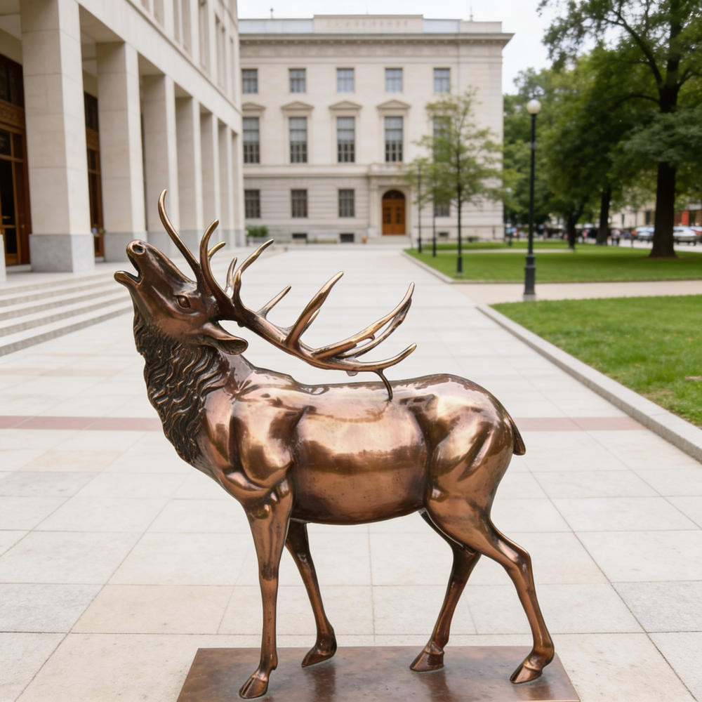 Bronze elk statue in front of a building with columns
Retail showrooms and high‑end storefront displays