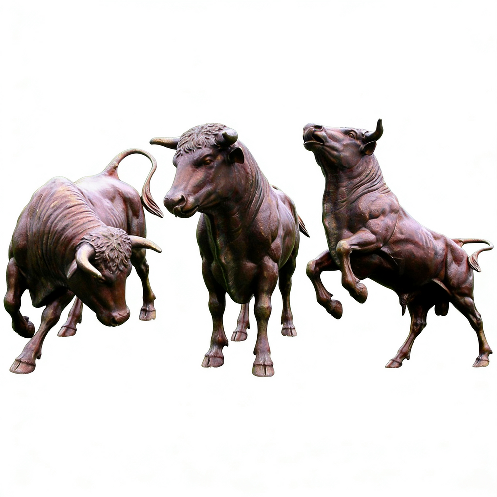 Bronze statue of three bulls on a white background