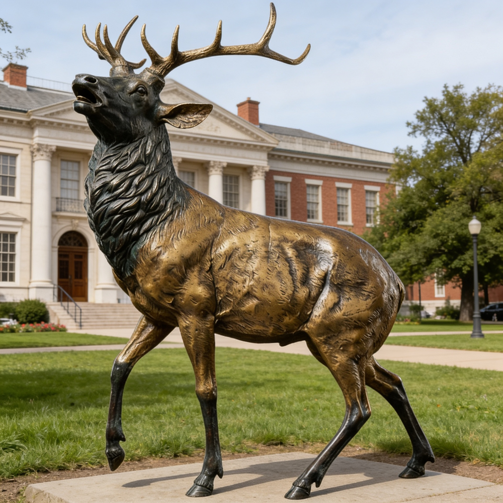 Realistic bronze stag statue featuring textured fur, strong musculature, and expressive posture
