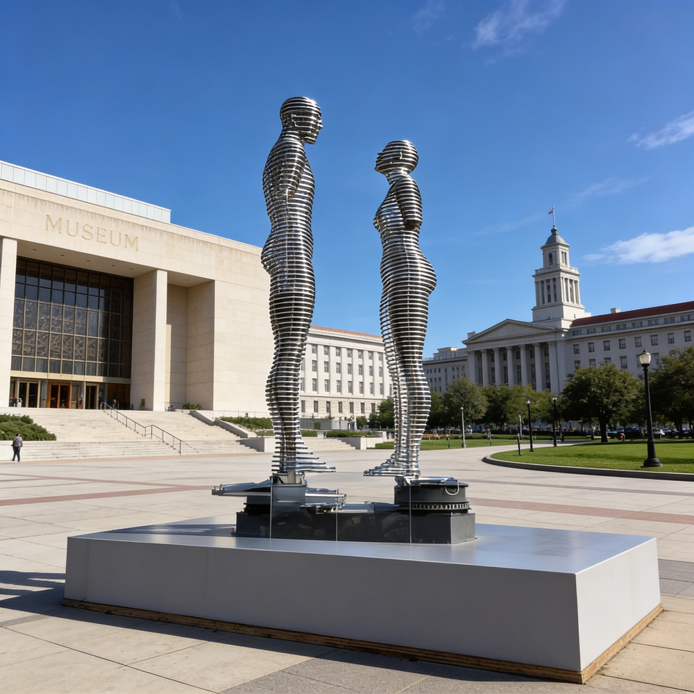 Sleek metallic artwork showing two stylized figures constructed from horizontal ring segments