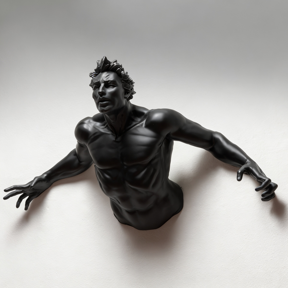 Black sculpture of a muscular figure on a white background