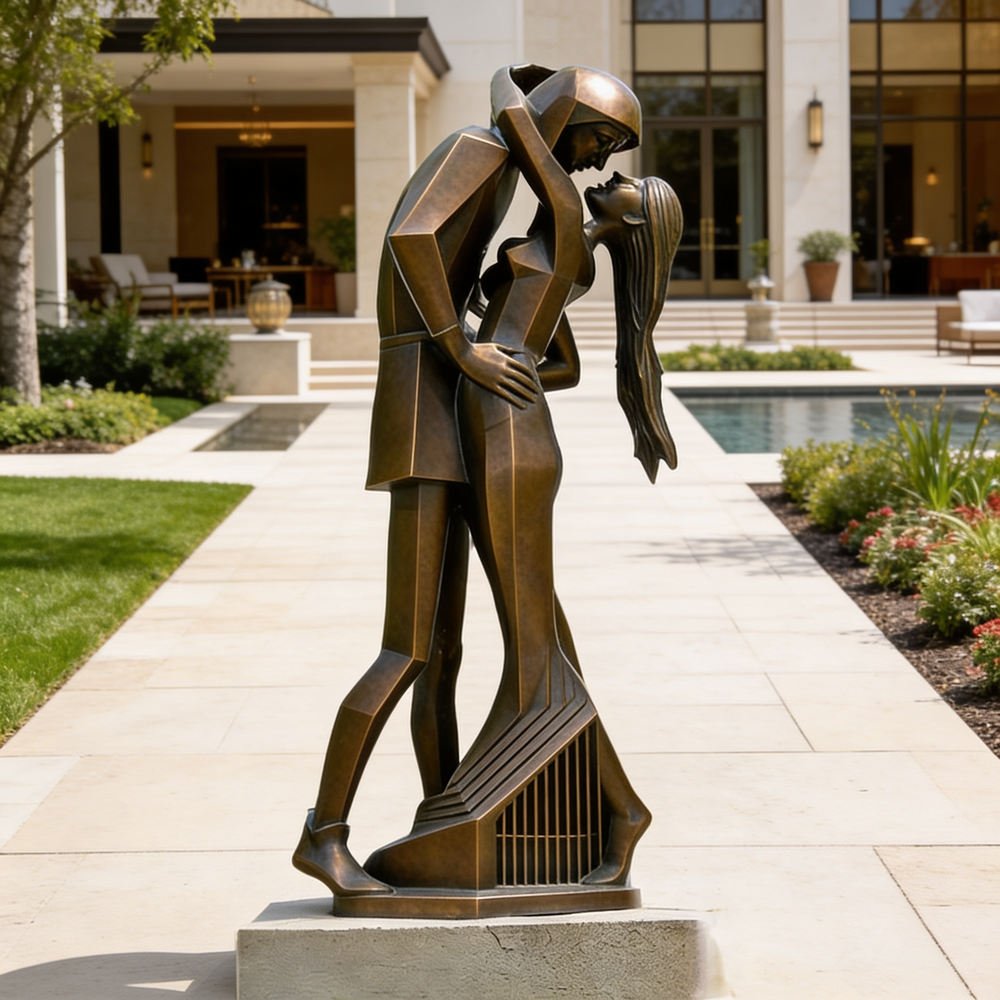 Bronze sculpture of a couple embracing in front of a building with a pool.