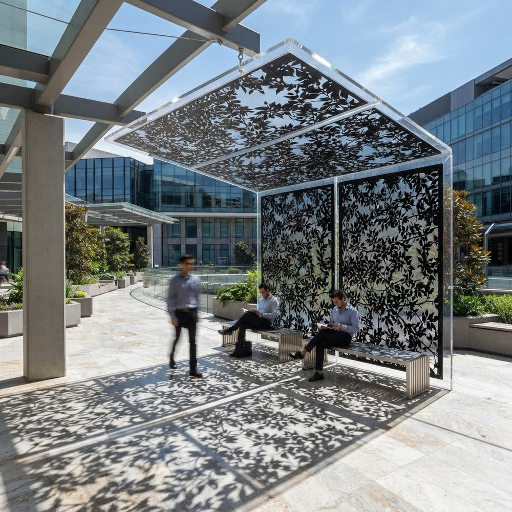 Modern metal privacy screen featuring intertwined branches and leaves