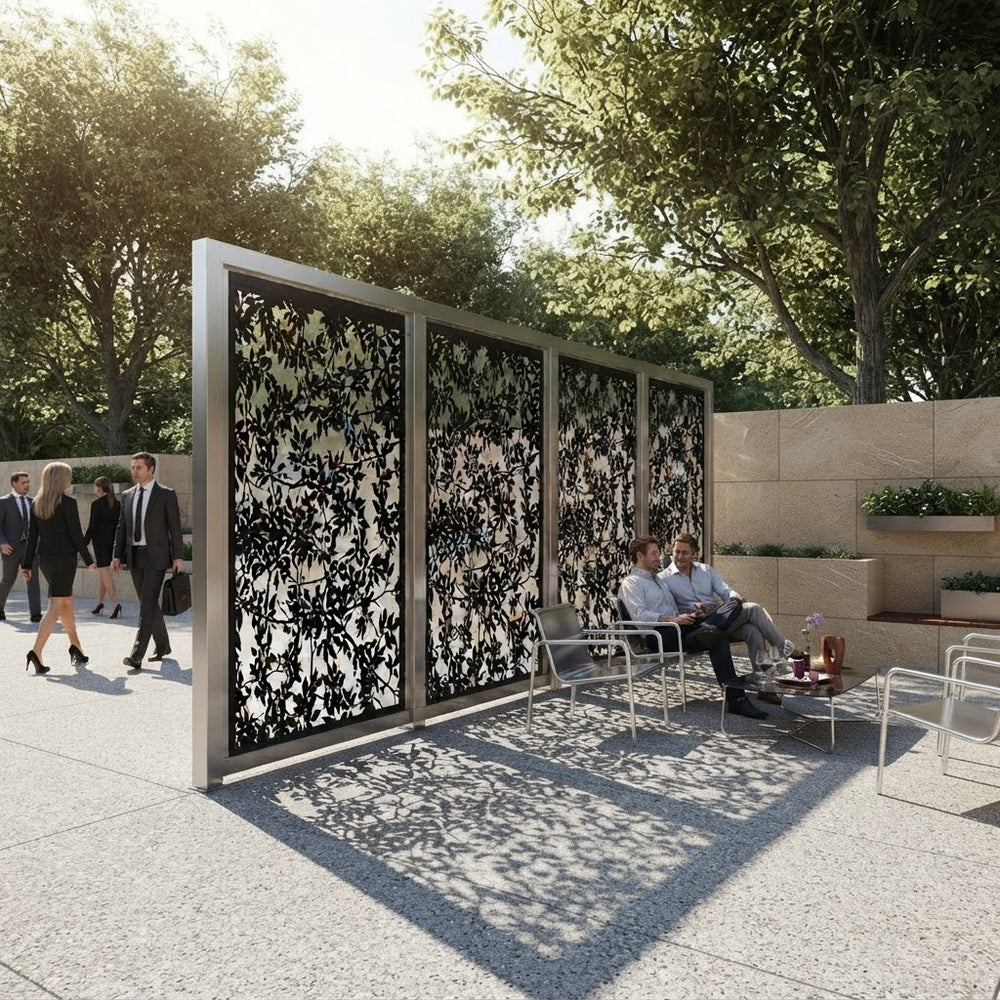 Custom metal privacy divider featuring intricate leaf and branch details