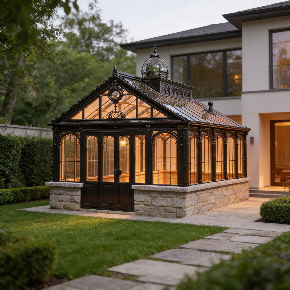 Orchard house with a large glass conservatory in a garden setting