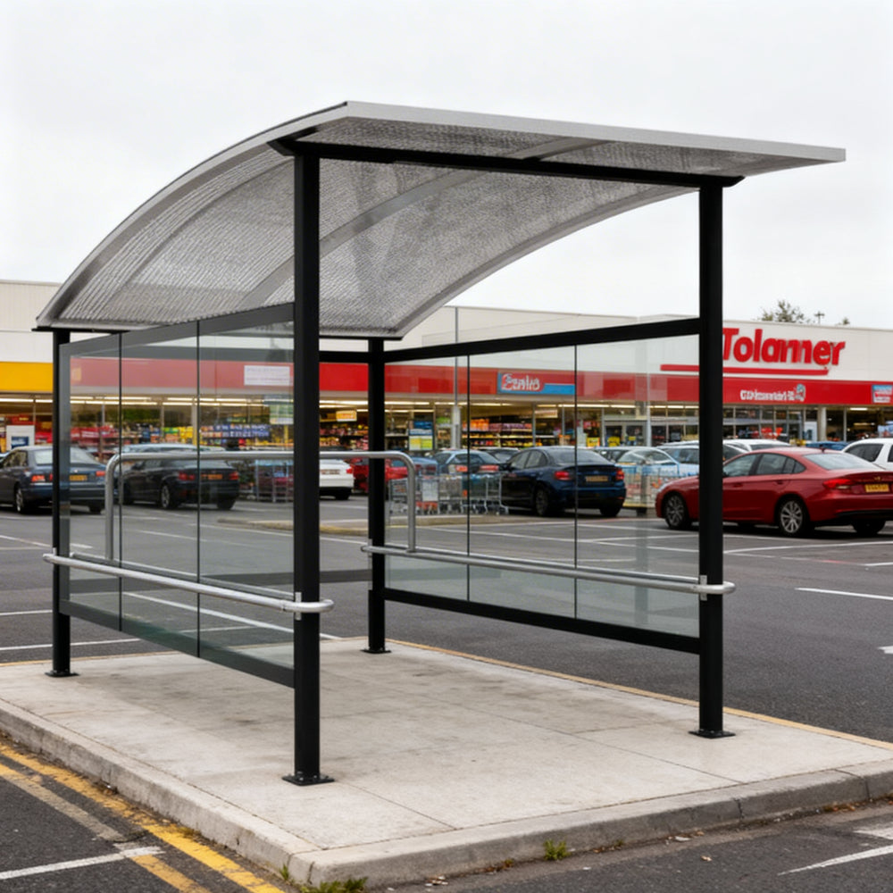 Interior of TAIMCO shopping cart shelter with stainless steel railings for organized cart storage.