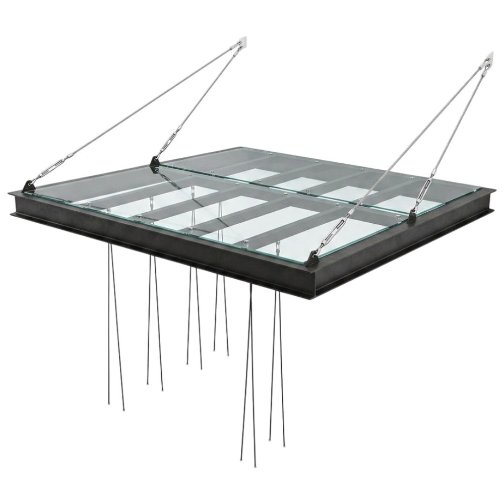 Glass roof structure with metal support on a white background