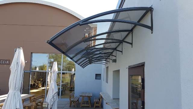 Steel Awnings with Clear polycarbonate Plastic - Custome Sizes and Shapes - Made in Canada - Model # WA894-Taimco