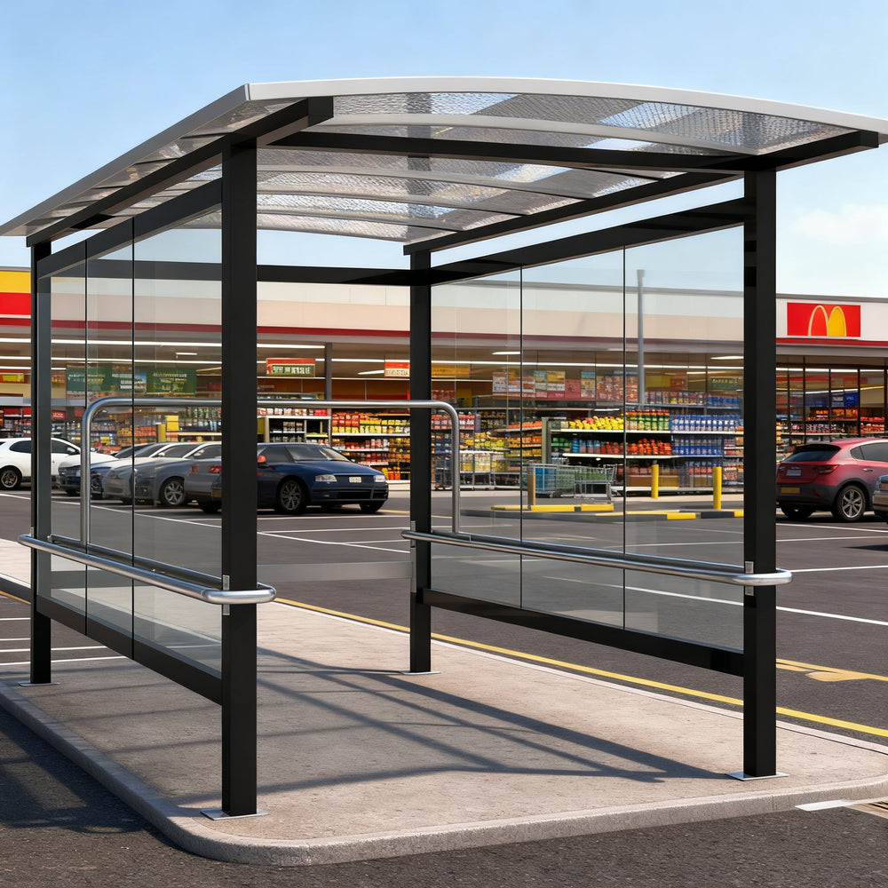 TAIMCO shopping cart shelter installed outdoors with curved roof and glass side panels for retail cart storage.