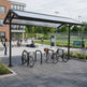 Bicycle parking area with a shelter in an urban setting