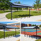 Bicycle shelter with bike racks in a schoolyard setting