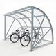 Bicycle shelter with two bicycles inside on a white background
