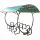 Outdoor canopy with circular seating area on a white background