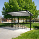 Pavilion with bike racks in a park setting