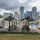 Bicycle parking area with city skyline in the background
