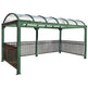 Green metal bus shelter with transparent roof on a white background