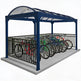 Bicycle parking shelter with multiple bicycles inside on a white background