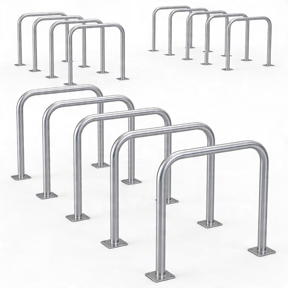 Set of stainless steel bike racks on a white background