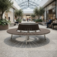 Circular tree‑surround bench with raised tapered inner cone

Wood‑slat ring bench with steel frame

Outdoor circular bench designed around a tree

Radial wood‑slat bench with elevated center

Modern circular bench with tapered inner structure

Steel frame tree‑surround seating bench

Circular park bench with open center

Hardwood slat bench with raised cone design

Public seating bench with circular wood slats

TAIMCO circular tree‑surround bench