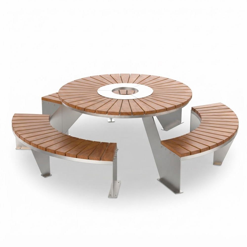 Outdoor round picnic table with integrated curved benches, featuring a warm brown wood-look slatted top and seat surfaces with a modern silver metal frame, shown on a white background.