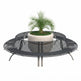 A round black metal slatted bench with a central planter holding a small green palm-like plant, shown on a plain white background.