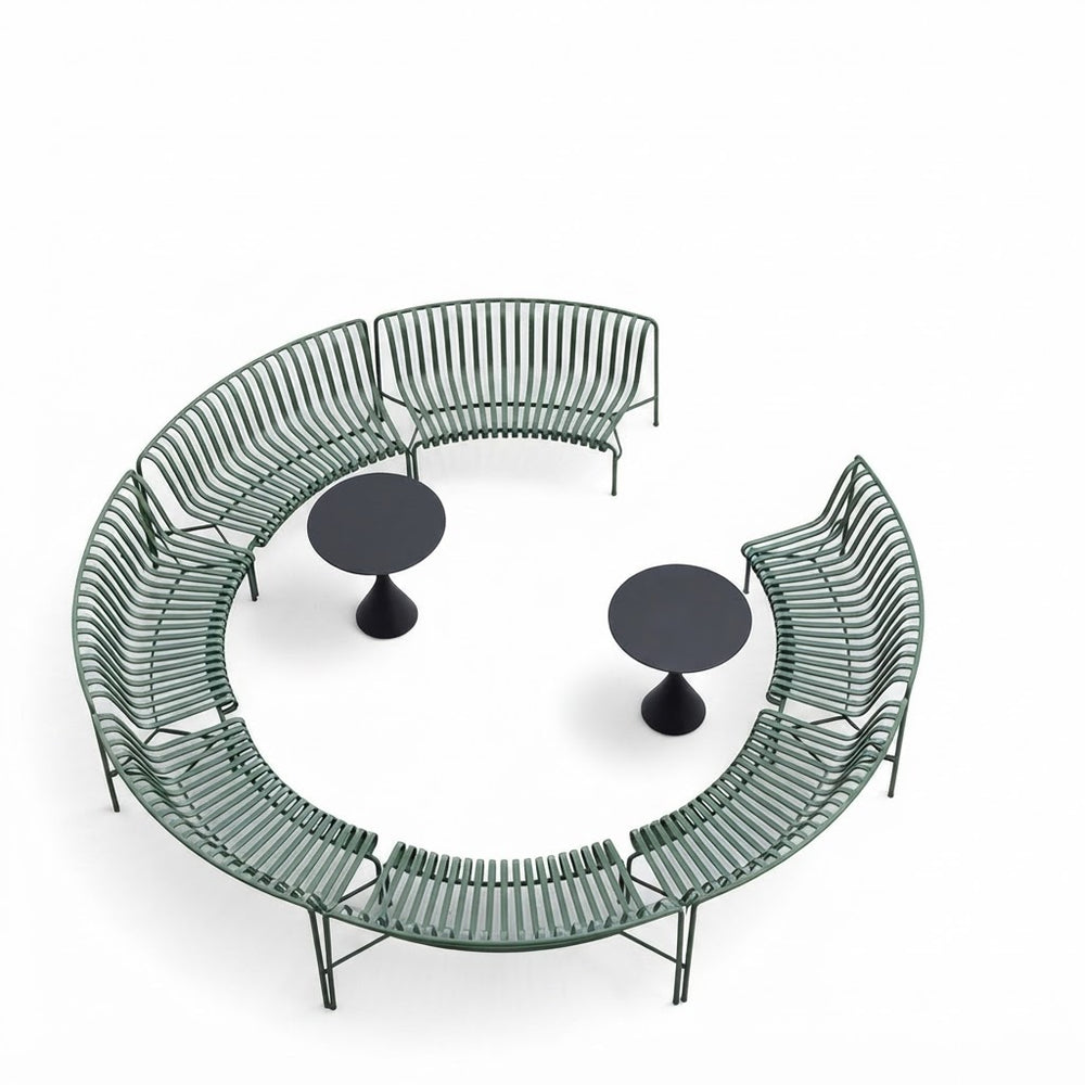 A modern outdoor seating set featuring a curved bench with green slatted metal seating, two matching black round pedestal tables, and a central black circular table, all arranged in a semi-circle on a white background.