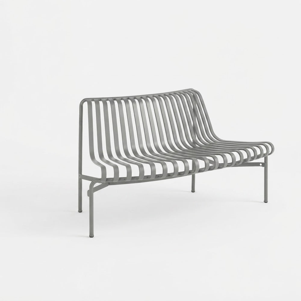 A modern gray metal slat bench with a curved backrest and seat, shown on a clean white background.