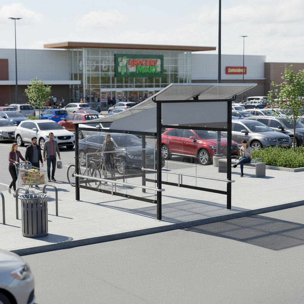 Side profile of modern shopping cart shelter featuring curved perforated roof and transparent glass enclosure.