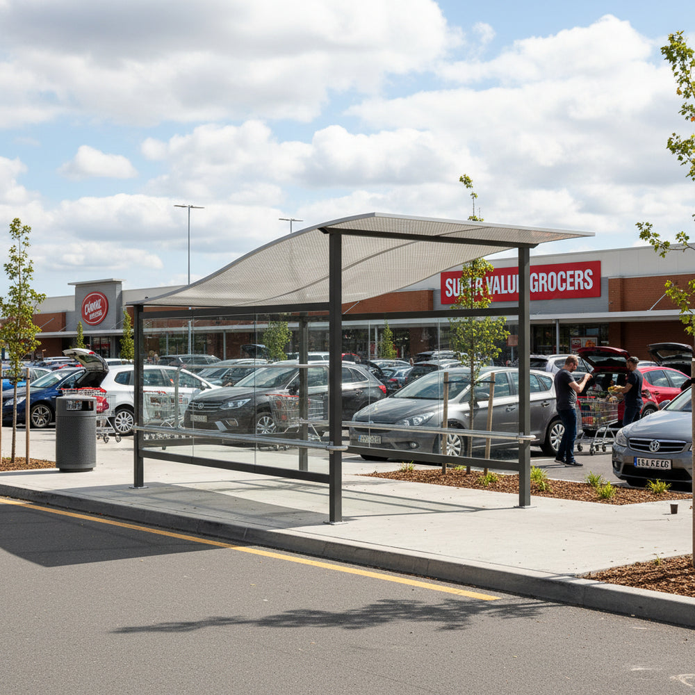 Interior of TAIMCO shopping cart shelter with stainless steel railings for organized cart storage.