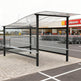Close‑up of wavy polycarbonate roof on TAIMCO shopping cart shelter showing modern weather‑resistant design.
