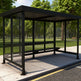 Interior of TAIMCO bus stop shelter with steel frame and built‑in bench for passenger seating.