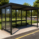 empered glass side panel on TAIMCO bus stop shelter offering visibility and weather protection.
