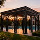 Side angle of steel pavilion featuring lattice infill panels