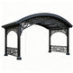 Three‑quarter view of steel pergola with ornate detailing