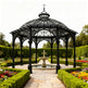 Square Gothic pavilion with slender columns and dome top.