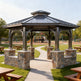Wooden gazebo with stone foundation in a park setting with playground in the background