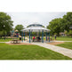 Octagon two‑tier steel gazebo with red metal roof and blue support columns