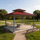Square two‑tier steel gazebo photographed on concrete base