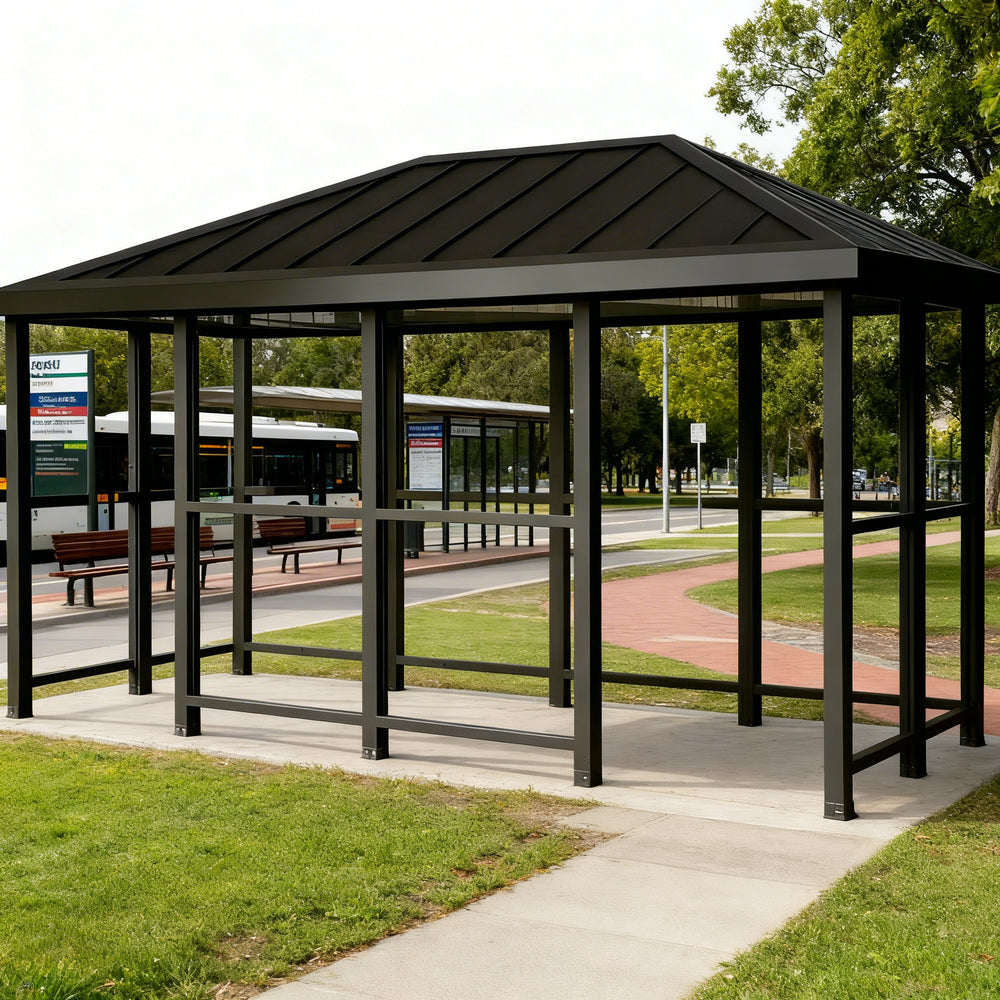 Interior of TAIMCO bus stop shelter with steel frame and open waiting area.