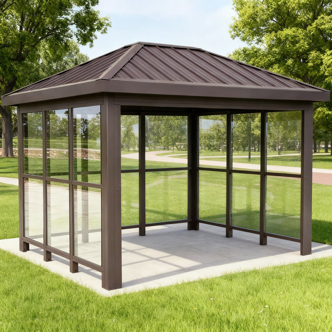 Side profile of modern bus stop shelter featuring slanted roof design and transparent glass enclosure.