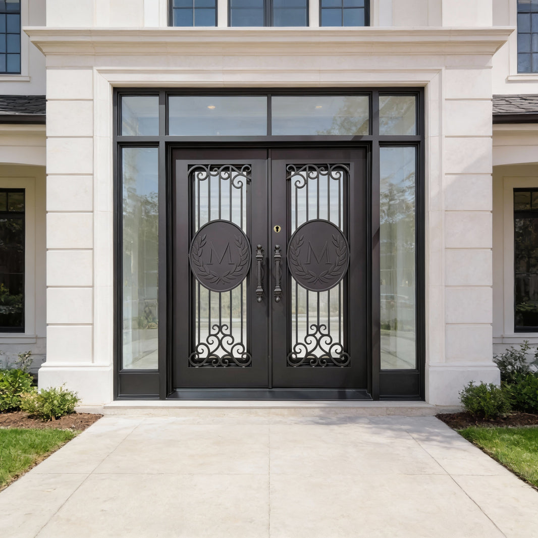 Double Wrought Iron Entry Doors – Black Finish with Signature “M” Medallions | Vertical Bars & Laurel Scrollwork | Model # IWD1064