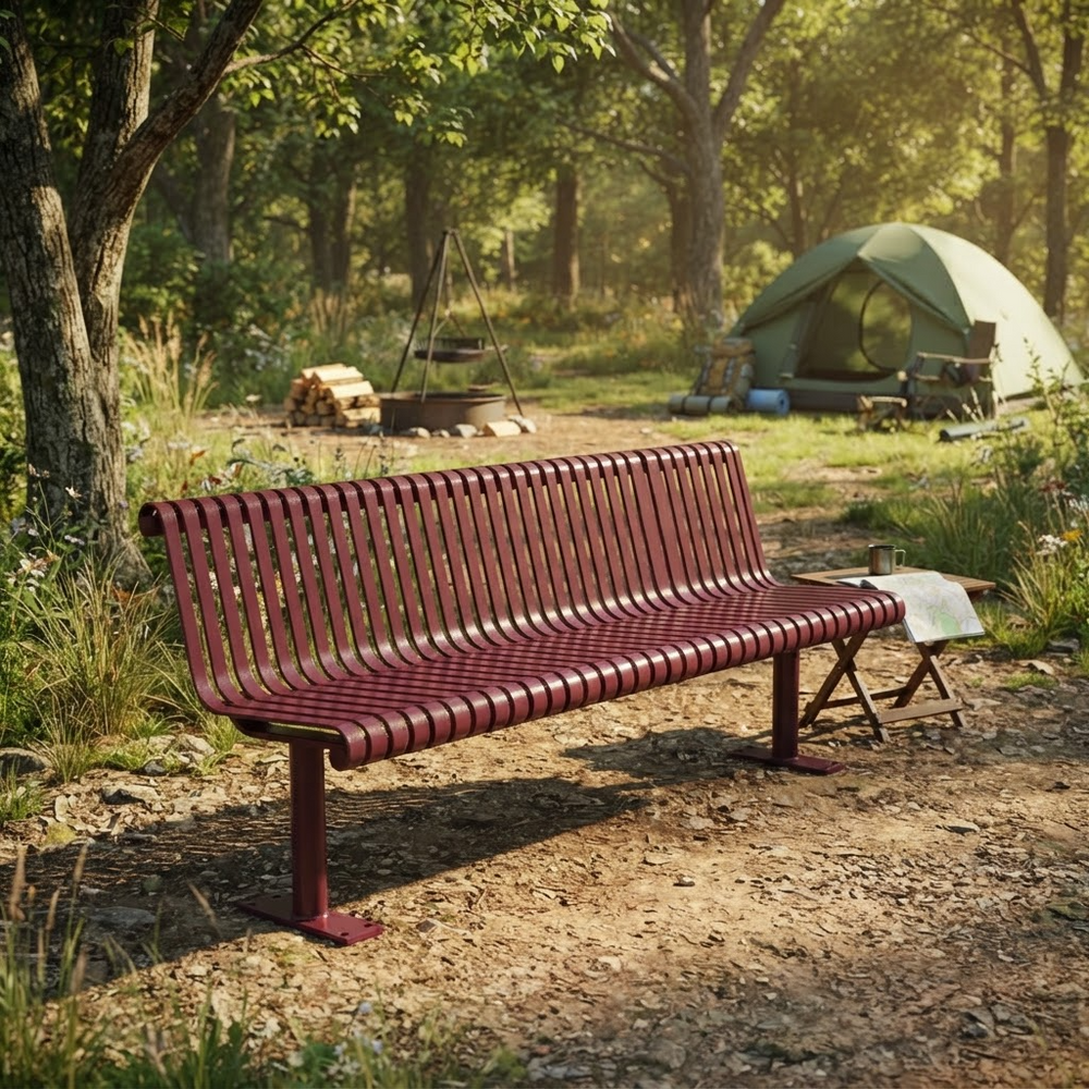 A reddish-brown slatted outdoor bench sits on a wooded campsite path, with a green tent, campfire, and trees in the background.